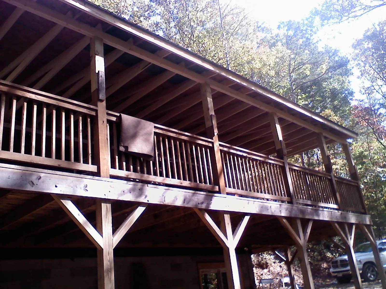 Timber framing under a new elevated porch and deck — Roof Leak Repair in Gunter by Roofing Brothers